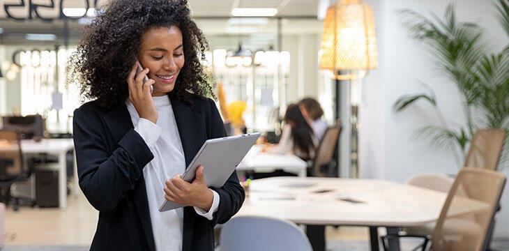 Curly Woman Smiling Tablet Tablet