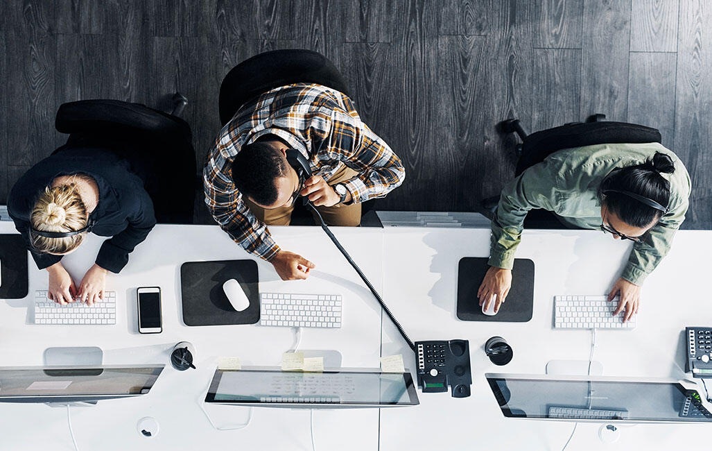  desk phone computer keyboard